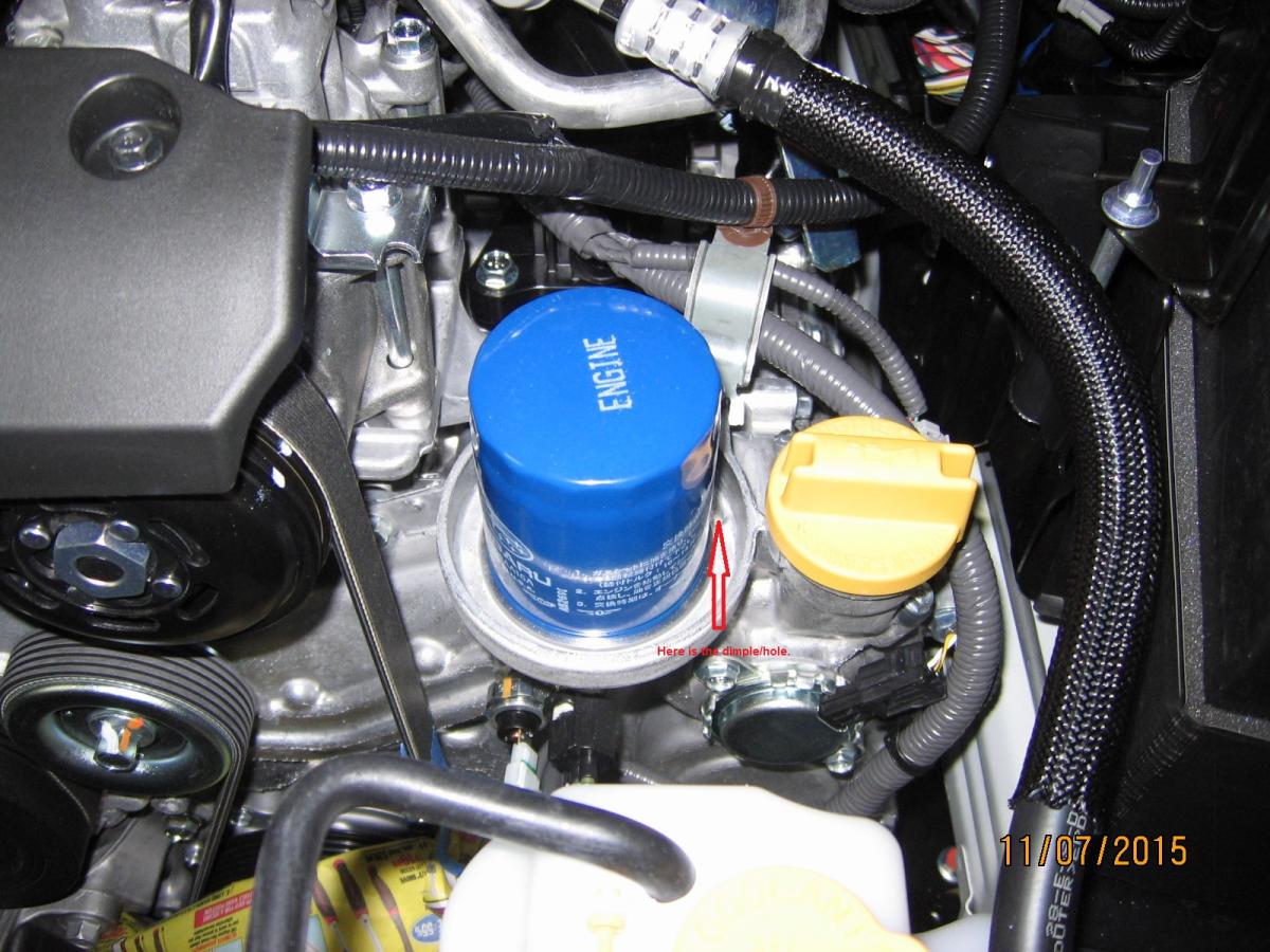 What's the purpose of the "hole" at Oil Filter Base for Subaru Forester