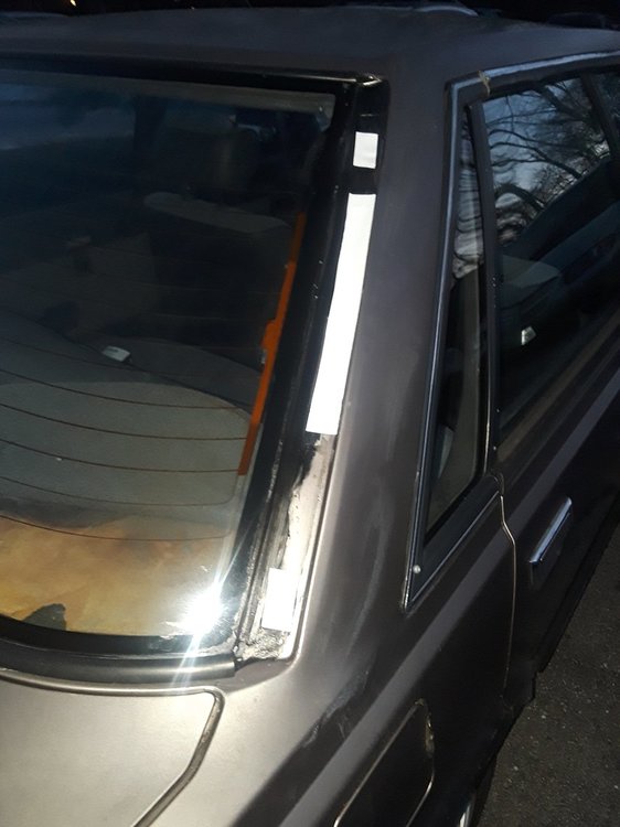 93 Loyale Right Rear Window Vents taped closed with out Cover.jpg